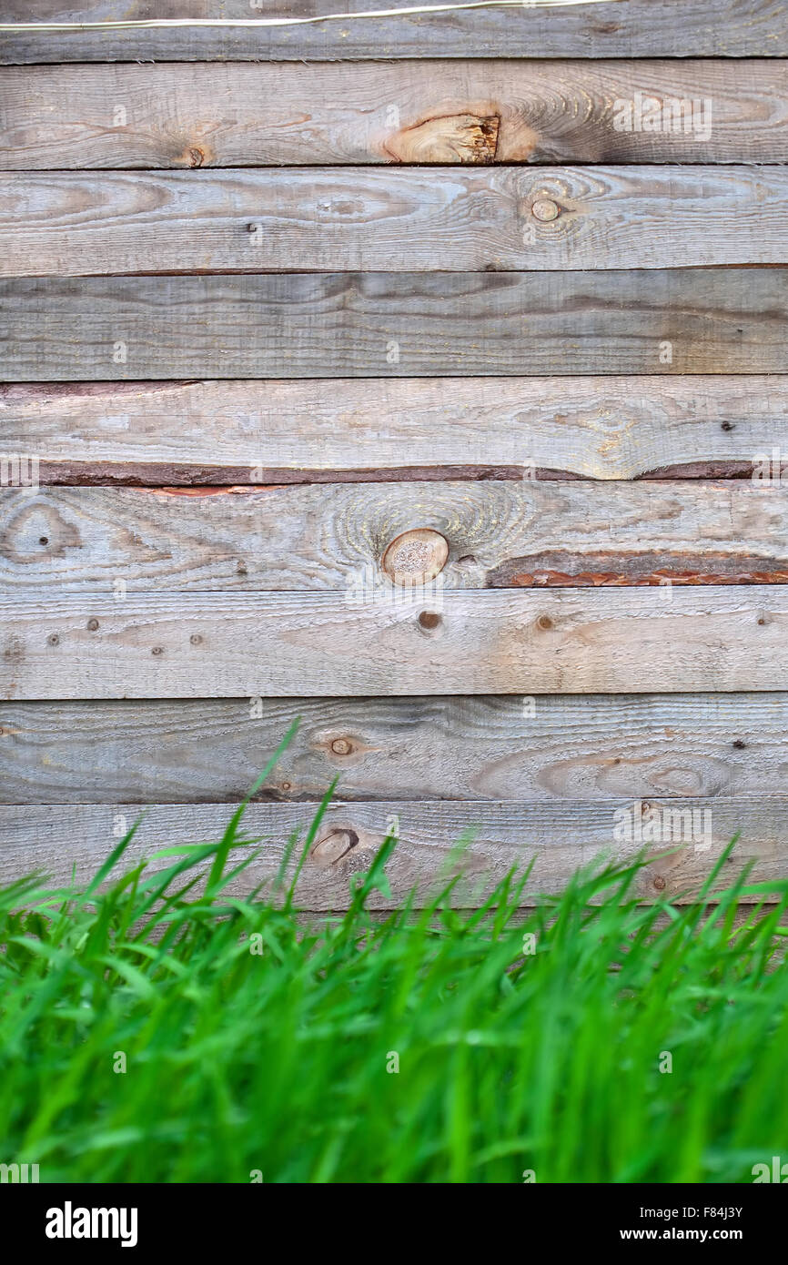 wooden fence with green grass background Stock Photo - Alamy