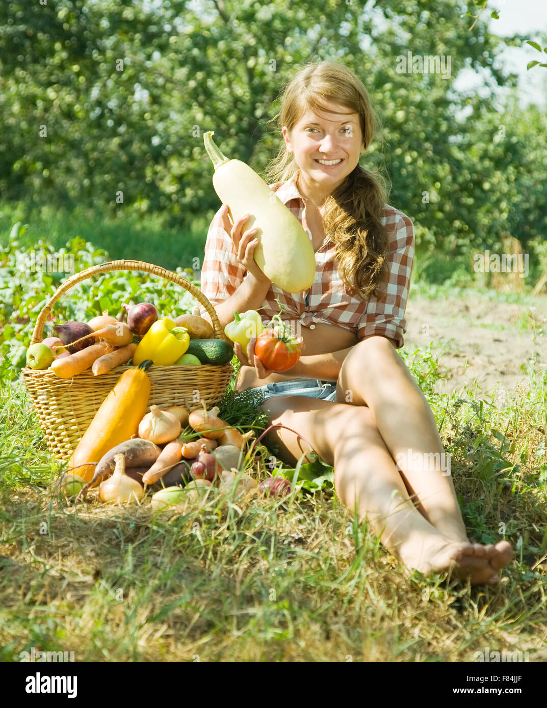 Teenage girl with basket of fruits and vegetables Stock Photo - Alamy