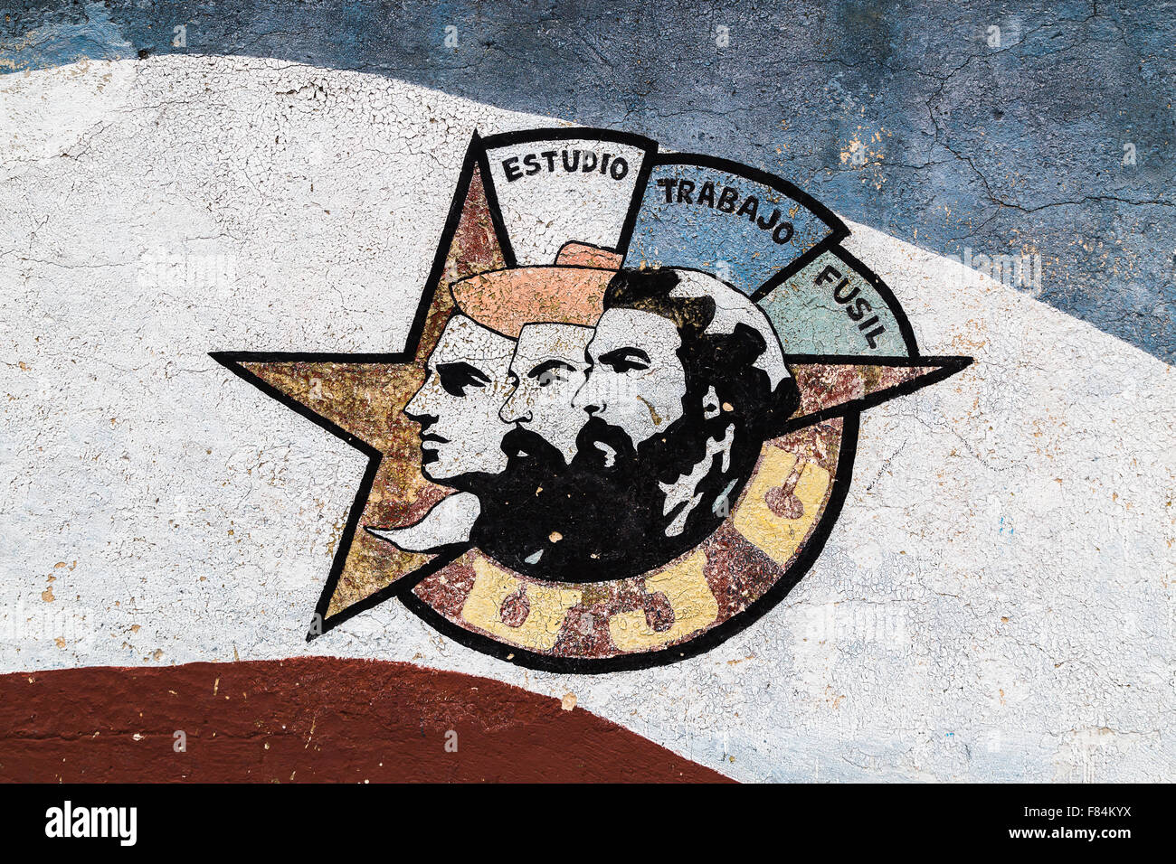 Close-up of a motif of the Young Communist League in Havana showing the faces of Julio Antonio Mella, Camilo Cienfuegos and Che. Stock Photo