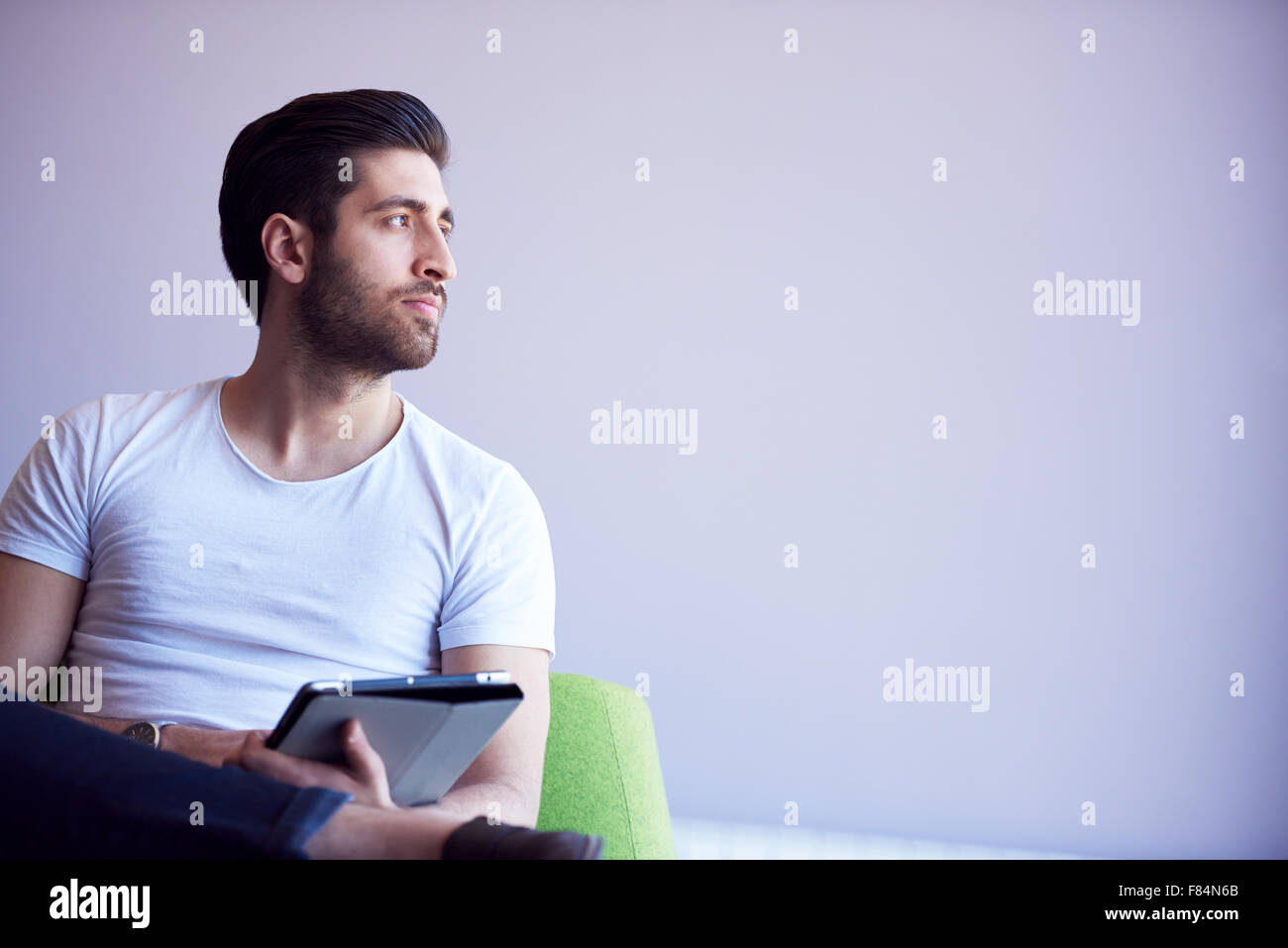 student working on tablet computer at university school modern interior ...
