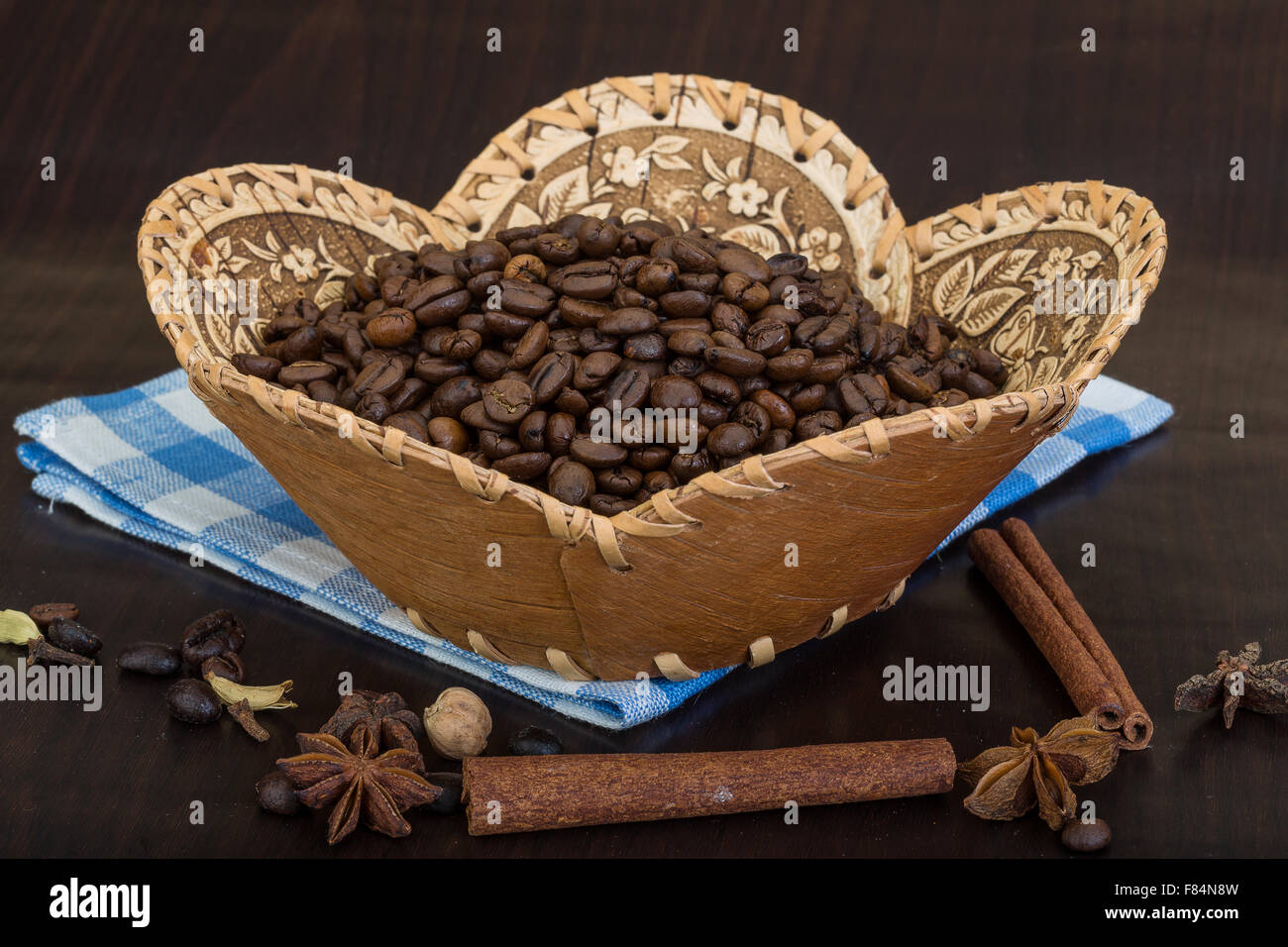 Roasted coffee beans in the bowl with cinamon Stock Photo - Alamy