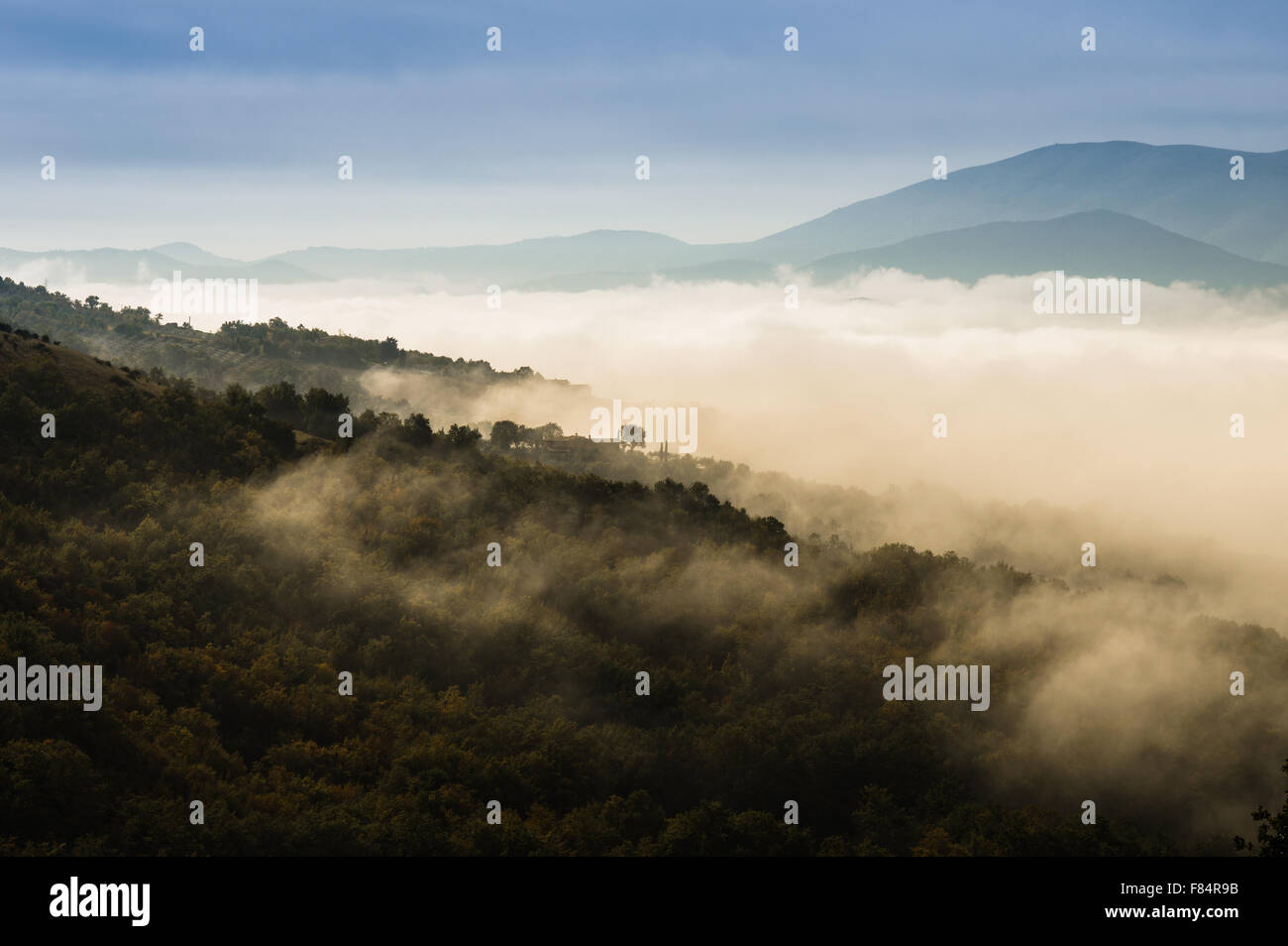 Fog covering the mountain forests in Umbria, Italy Stock Photo - Alamy