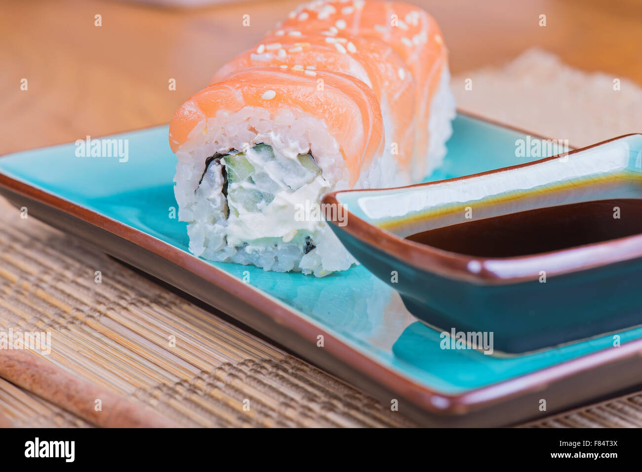 California maki sushi with fish and soy sauce Stock Photo Alamy