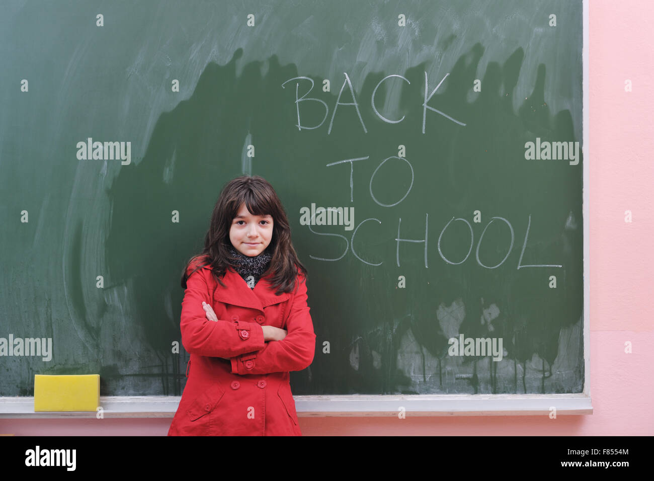 happy school girl on math classes finding solution and solving problems ...