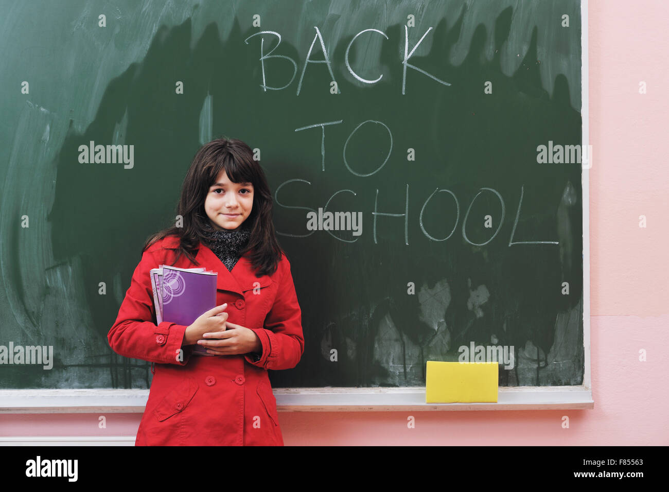 happy school girl on math classes finding solution and solving problems ...