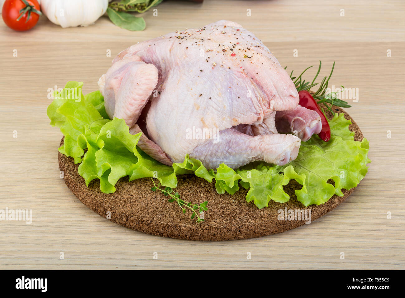 Raw Quail with herbs ready for cooking Stock Photo Alamy