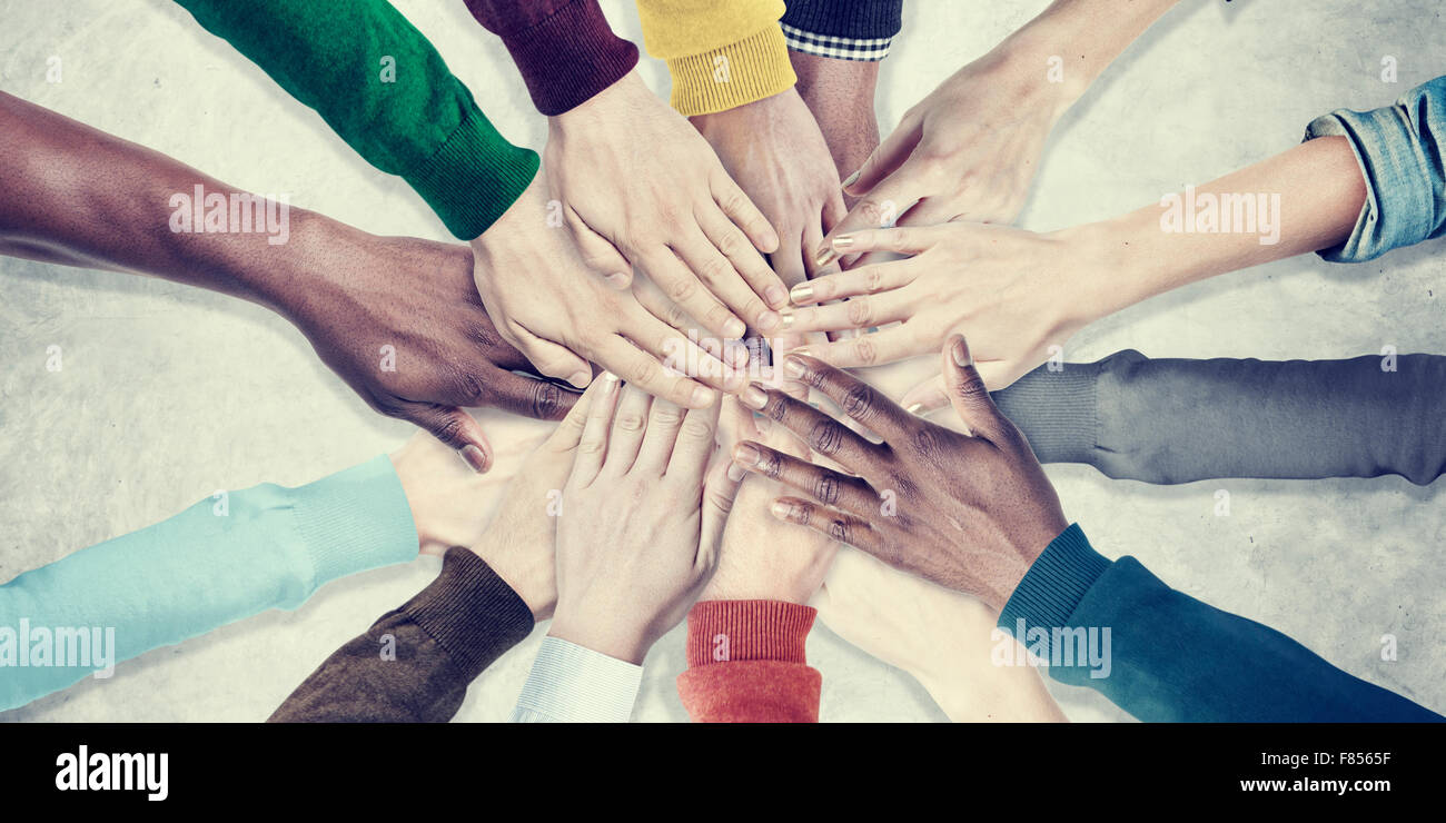 Team unity hands together hi-res stock photography and images - Alamy
