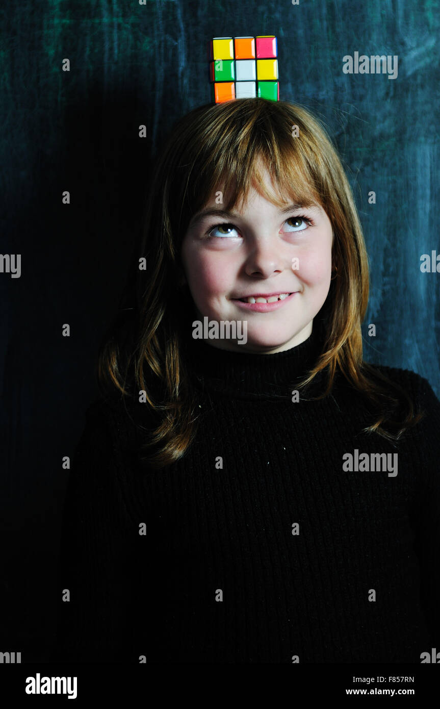 happy school girl on math classes finding solution and solving ...