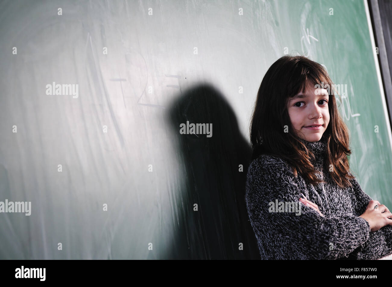 happy school girl on math classes finding solution and solving problems Stock Photo