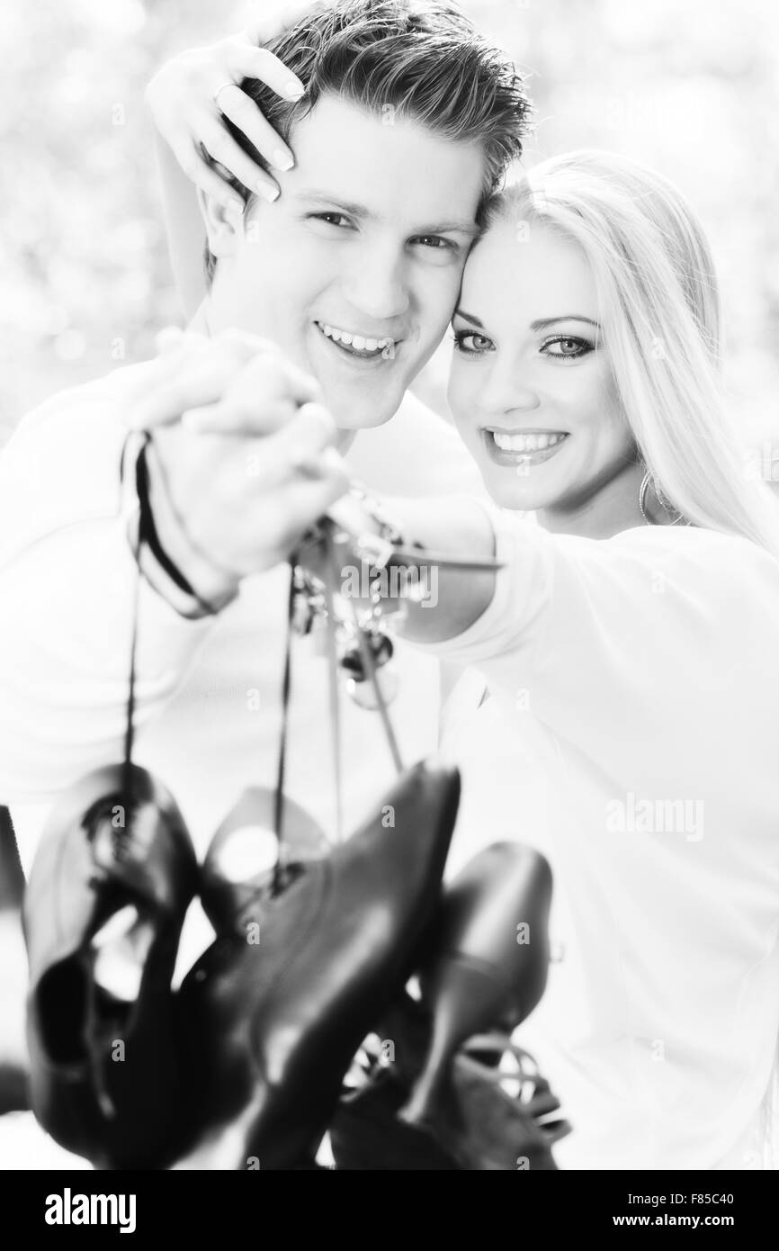 happy young romantic couple in love dance outdoor at spring season on