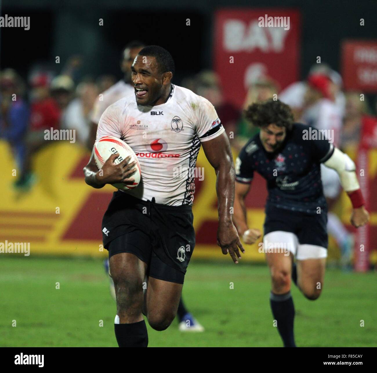 Dubai. 05th Dec, 2015. UAE. Cup Final, Fiji 28 v 17 England at The Sevens in Dubai, UAE during the HSBC World Rugby Sevens Series. Dan Bibby cannot catch Pio Tuwai the try maker Credit:  Action Plus Sports/Alamy Live News Stock Photo