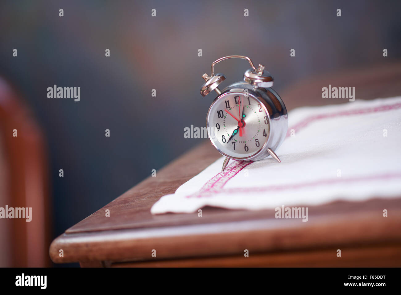 vintage retro old clock at wooden table Stock Photo