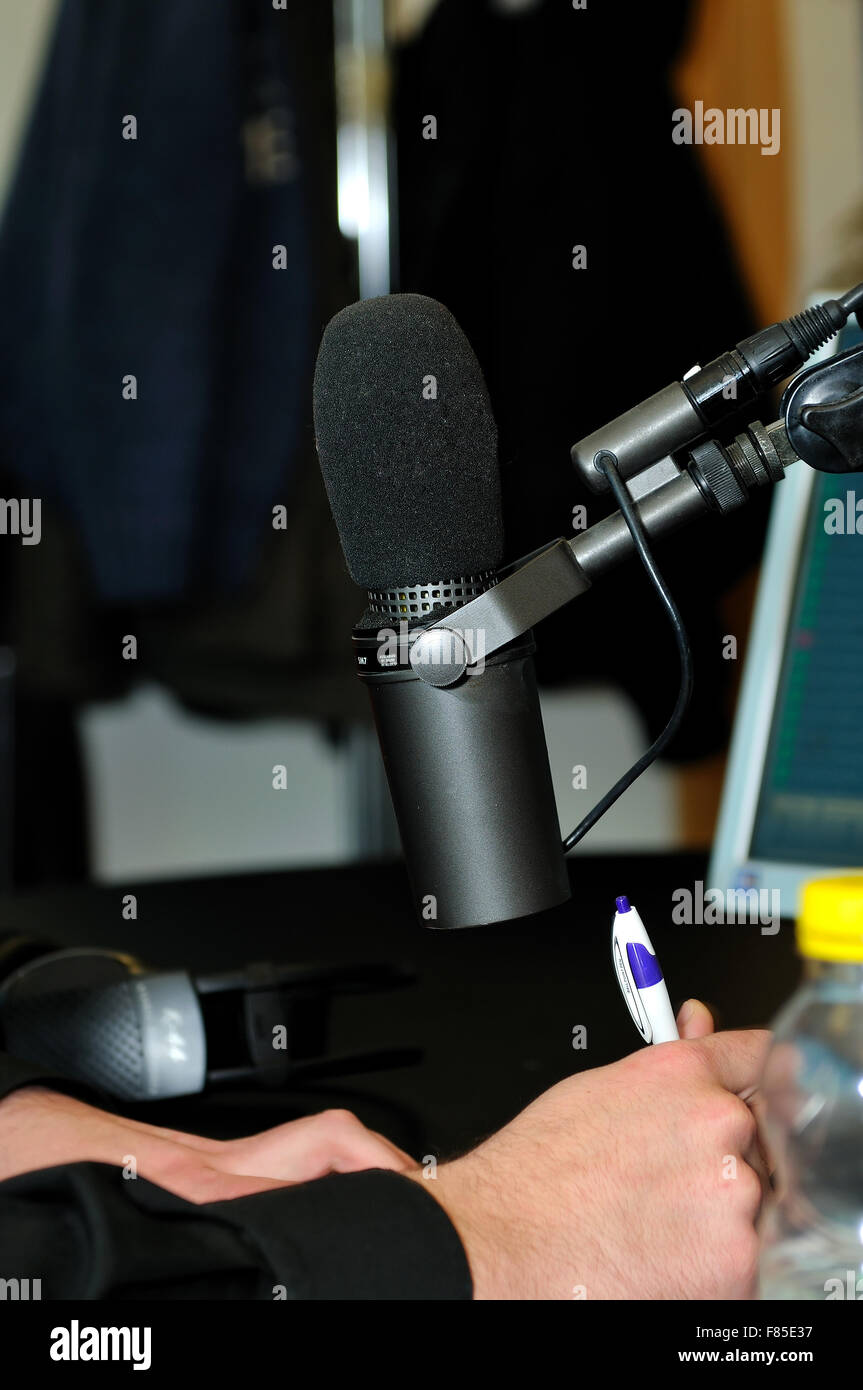 radio station dj reading news and info Stock Photo - Alamy