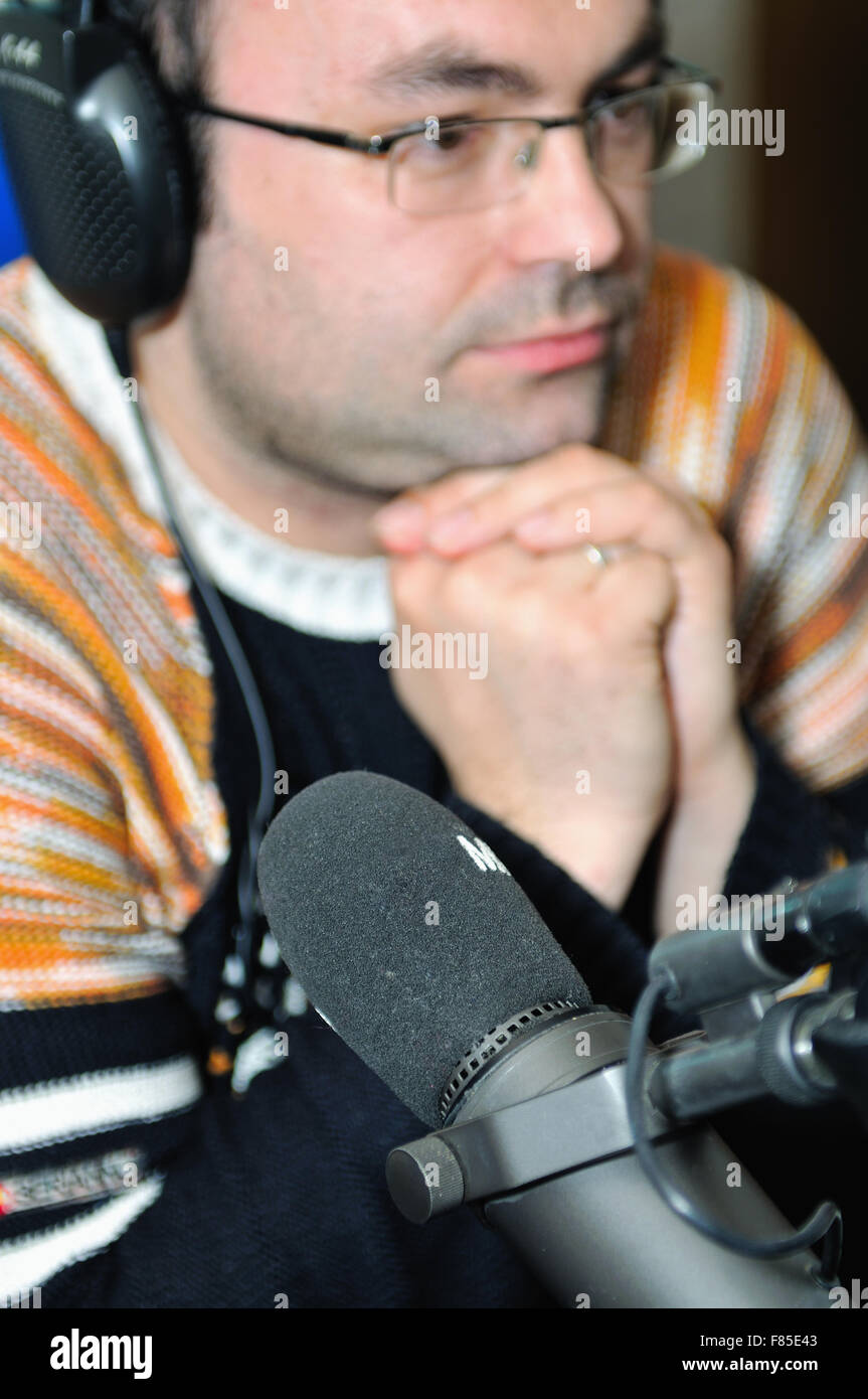 radio station dj reading news and info Stock Photo - Alamy