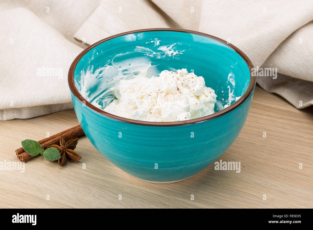 Ricotta cheese with cinnamon and mint leaves Stock Photo Alamy