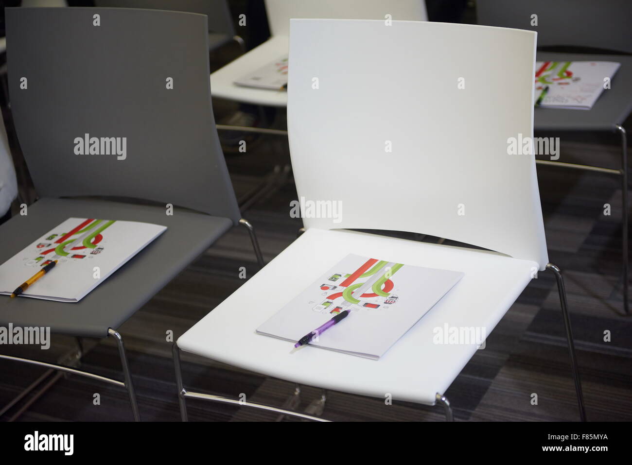 conference room chairs details, notes and pen as free gift Stock Photo ...