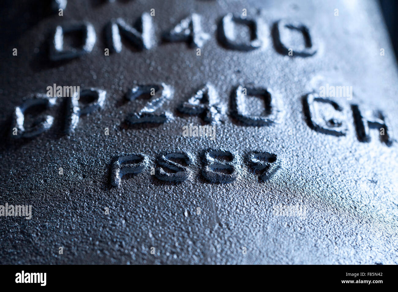 Marking on iron cast valve body Stock Photo Alamy