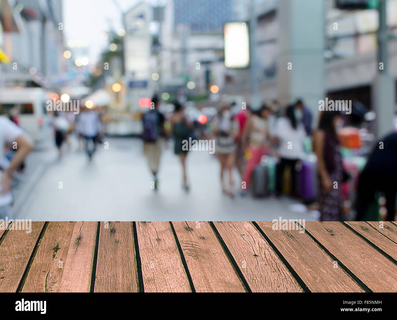 Wood top Blurred walking on the street background. product display template. Stock Photo