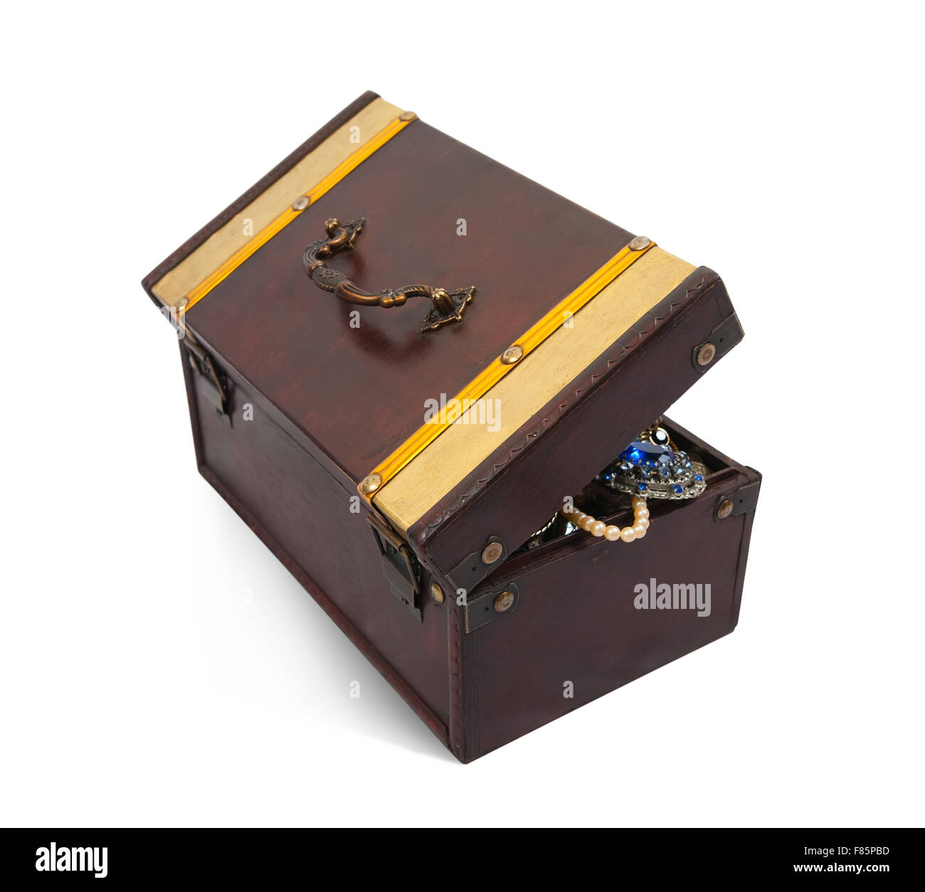 wooden treasure chest with valuables, isolated over white background