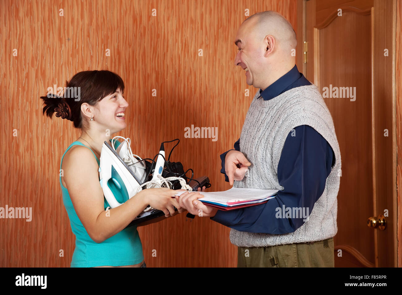 Woman buys home appliances on credit and happy Stock Photo Alamy