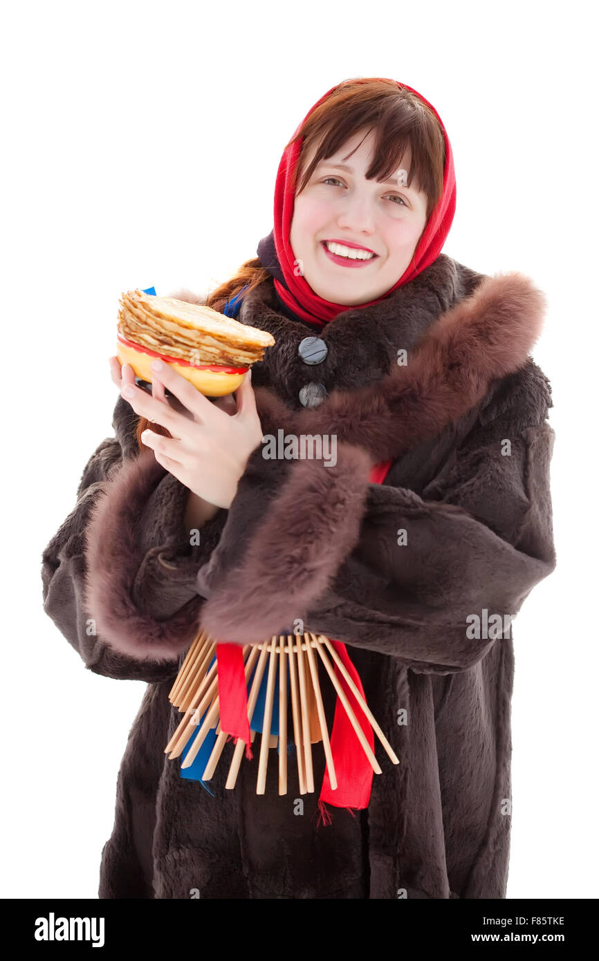 Woman in fur coat with pancake. Isolated over white Stock Photo