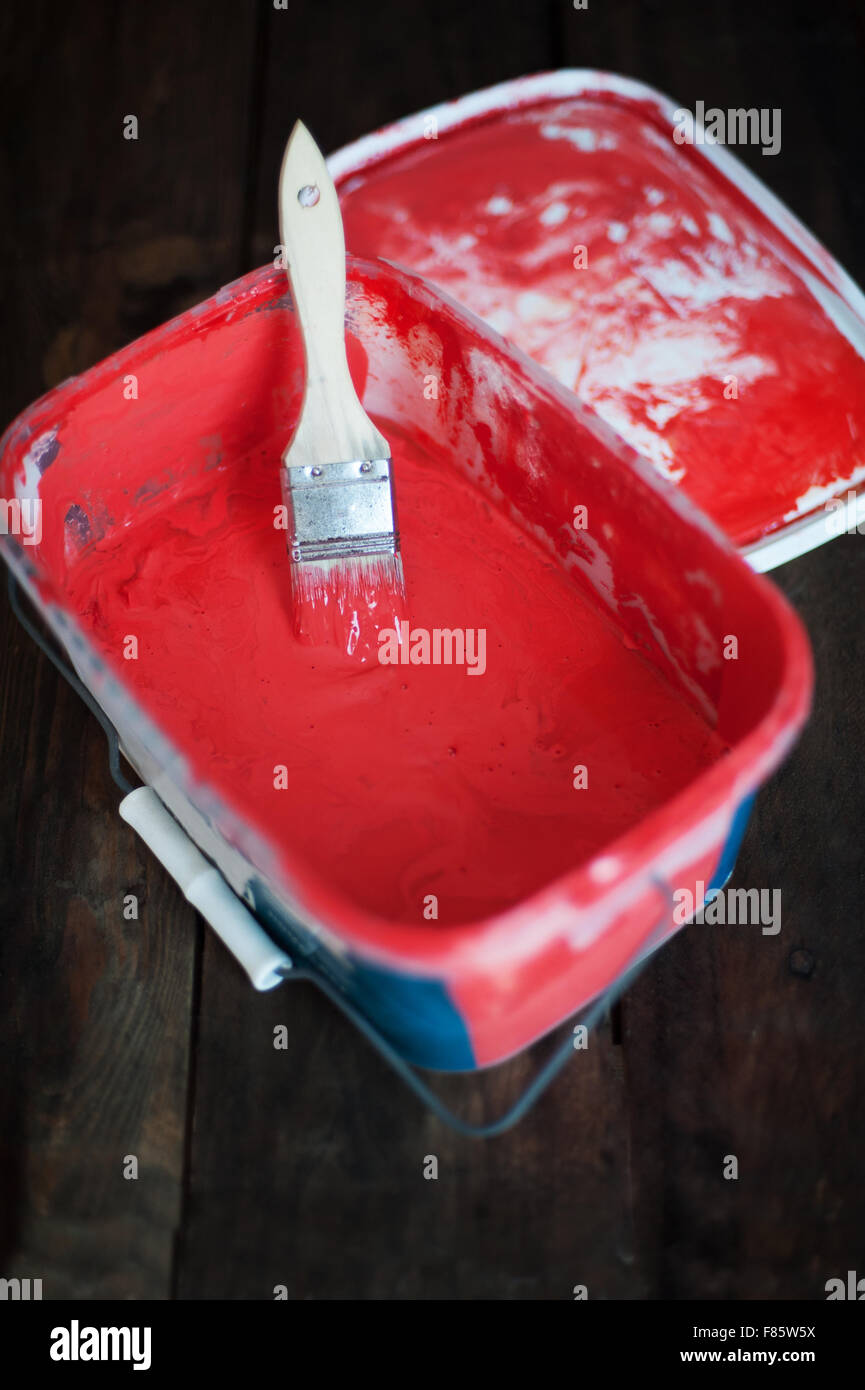 Red paint in a bucket Stock Photo Alamy