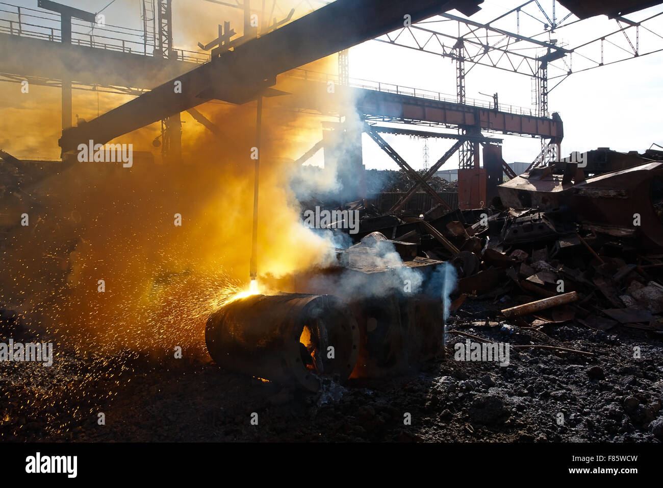 Scrap Metal Exploding Scrap metal and smoke Stock Photo - Alamy