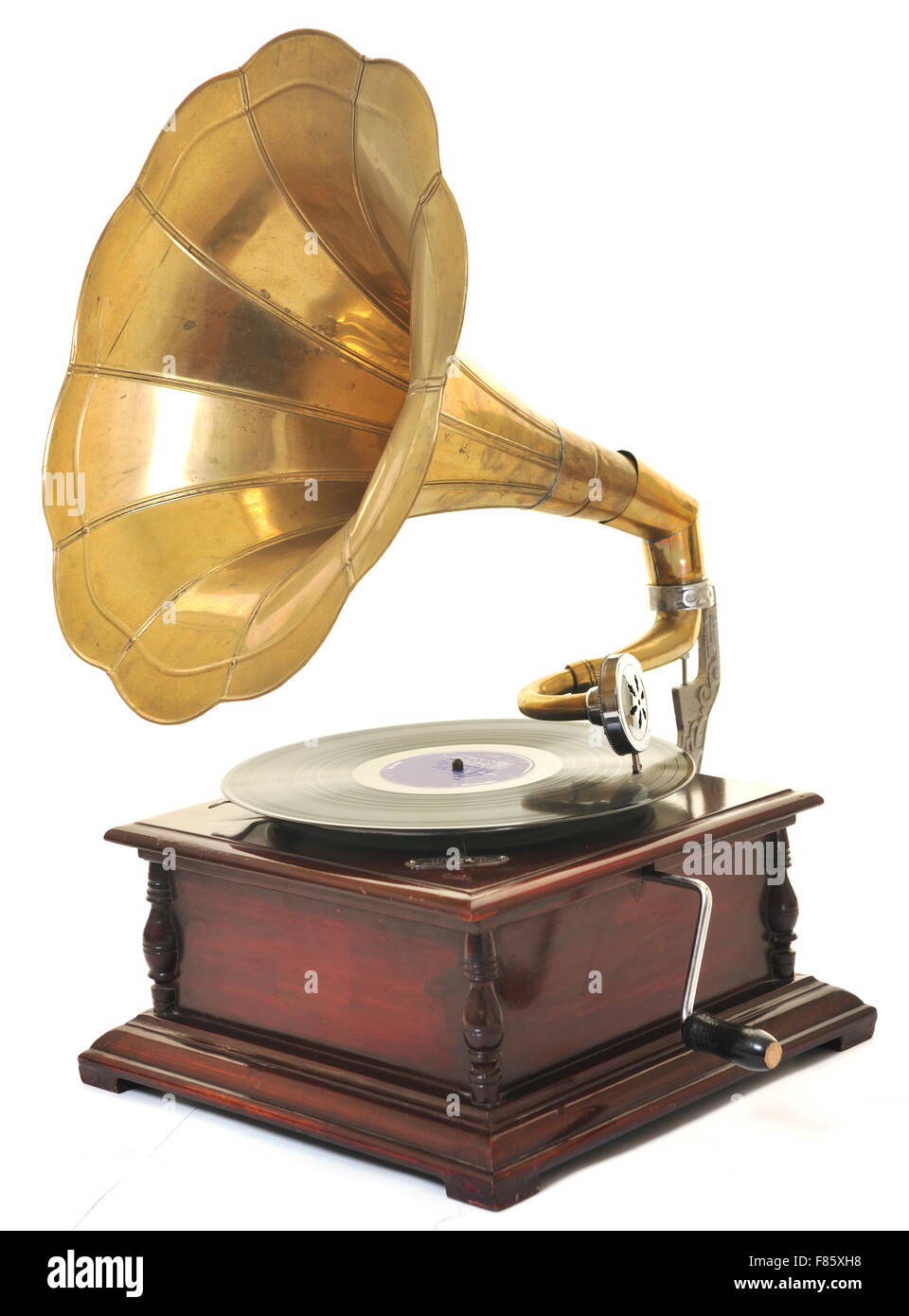 retro old gramophone with horn speaker for playing music over plates  isolated on white in studio Stock Photo - Alamy