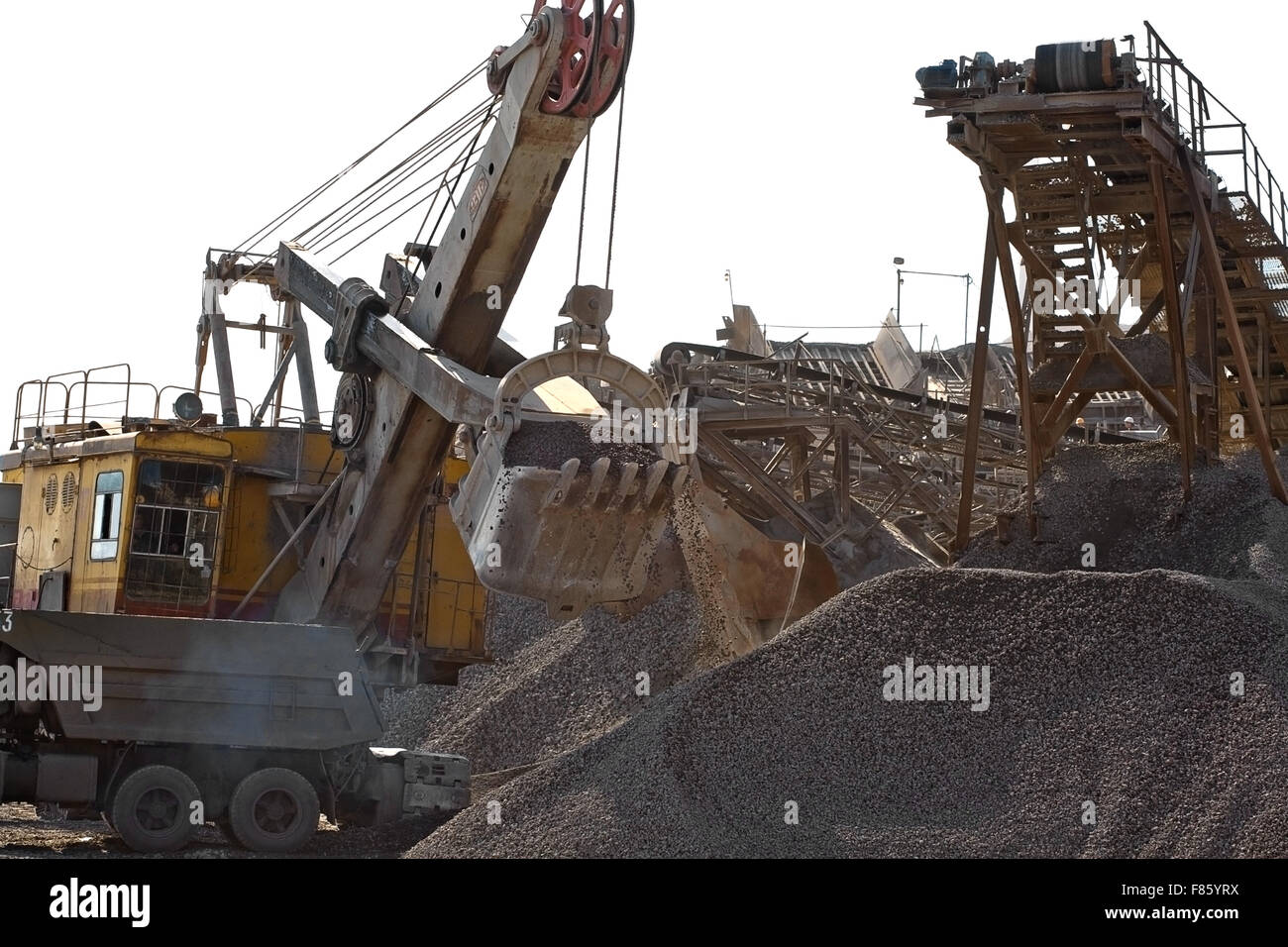 Excavator bucket gaining rubble Stock Photo - Alamy