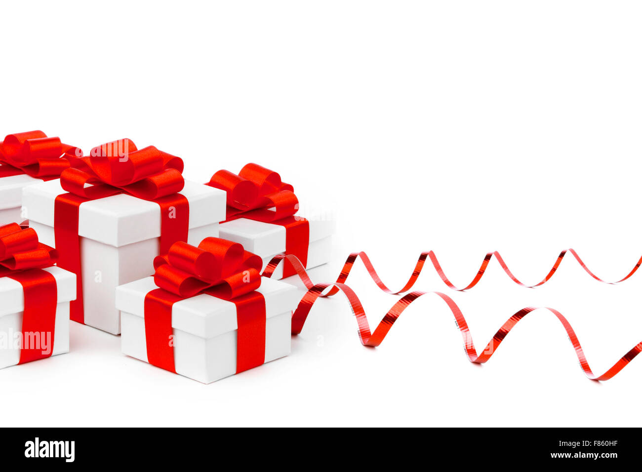 White gift boxes with red ribbons isolated on white background Stock ...