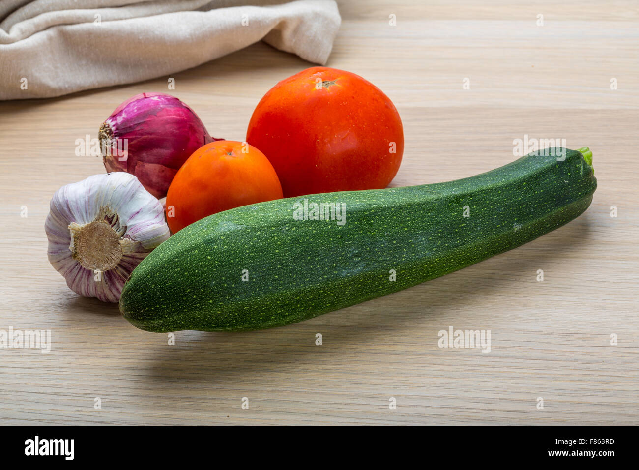 Zucchini with tomato, onion and garlic Stock Photo - Alamy