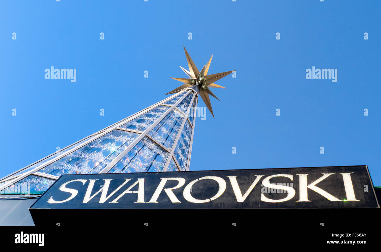 A Christmas tree set up by Swarovski company in Marktplatz at Innsbruck. The tree was built with glass and several crystals. Stock Photo