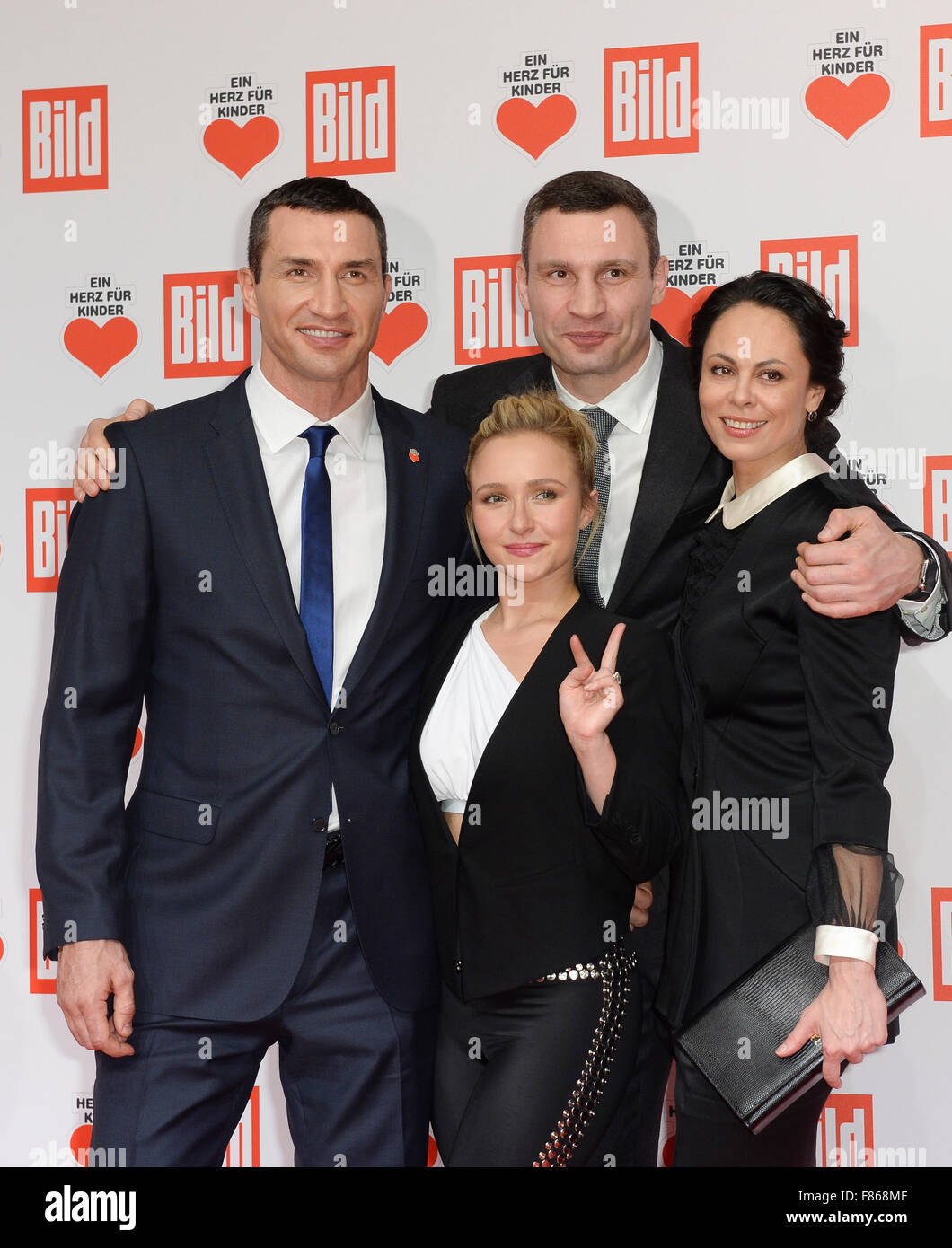 Berlin, Germany. 05th Dec, 2015. Ukrainian boxer Wladimir Klitschko (L) with his girlfriend US actress Hayden Panettiere (2nd L) and the former boxer Ukrainian Vitali Klitschko (R) and his wife Natalia (2nd R) arrive at the 'Ein Herz fuer Kinder' (lit. A Heart for Children) fundraising gala in Berlin, Germany, 05 December 2015. The gala is broadcast live on ZDF. Photo: Joerg Carstensen/dpa/Alamy Live News Stock Photo