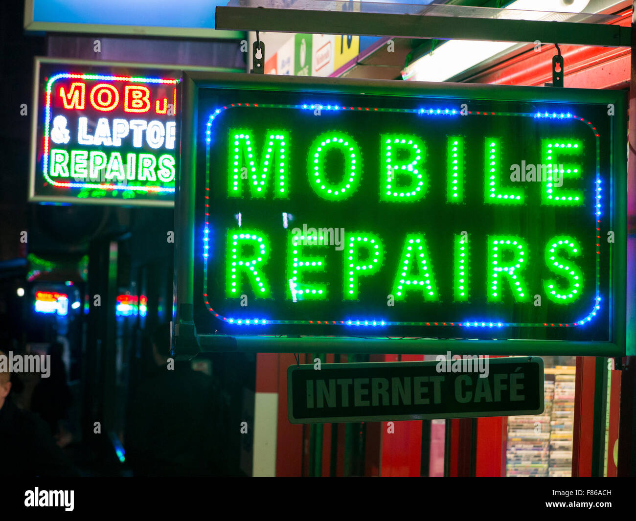 mobile phone and laptop repair signs Stock Photo
