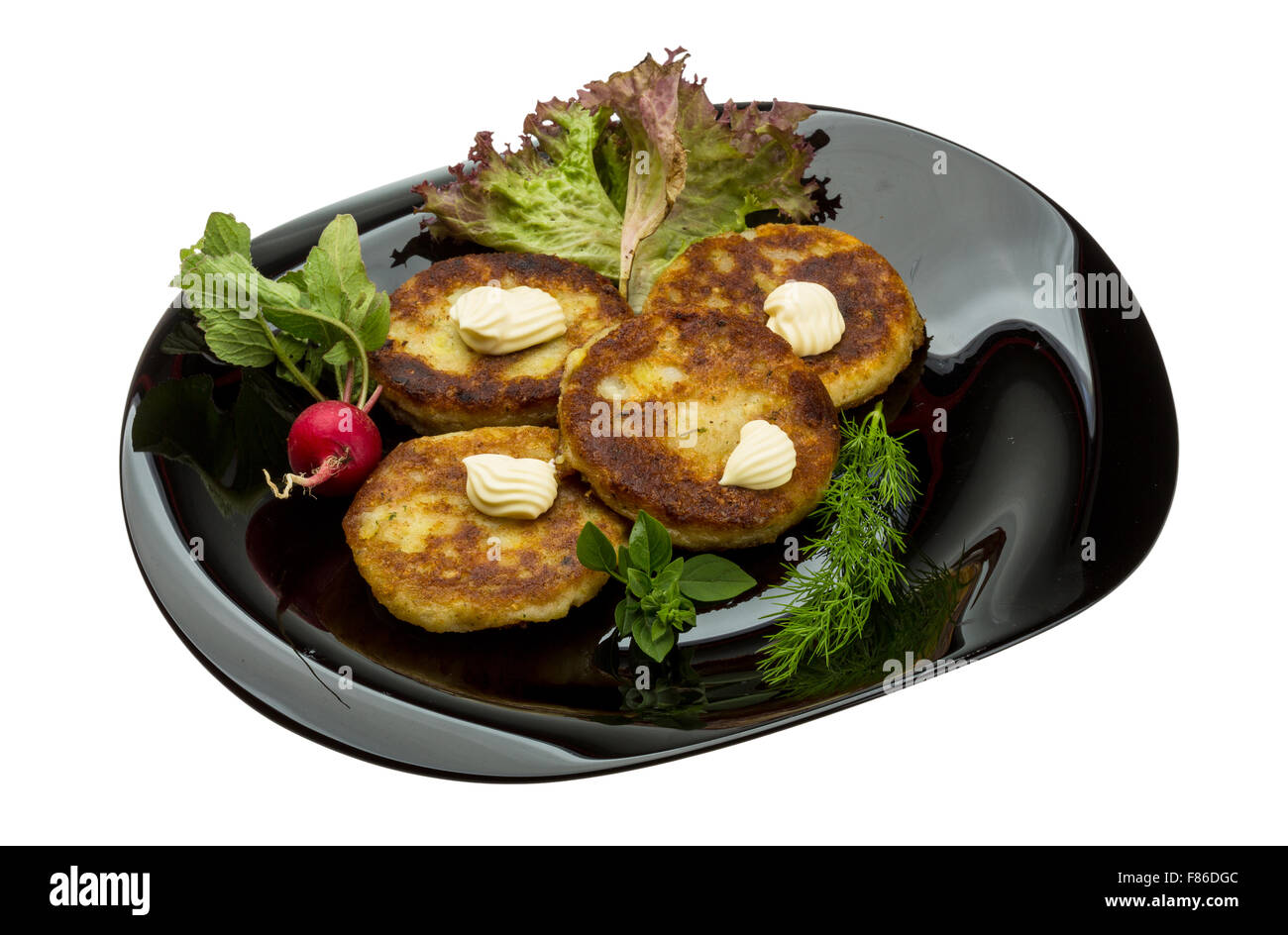Hash browns with herbs on the plate Stock Photo Alamy