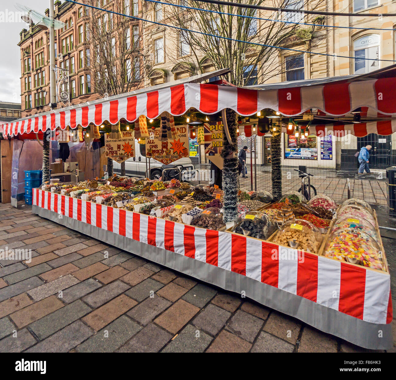 Glasgow Xmas market December 2015 in St. Enoch Square Glasgow Scotland with sweets stall Stock Photo