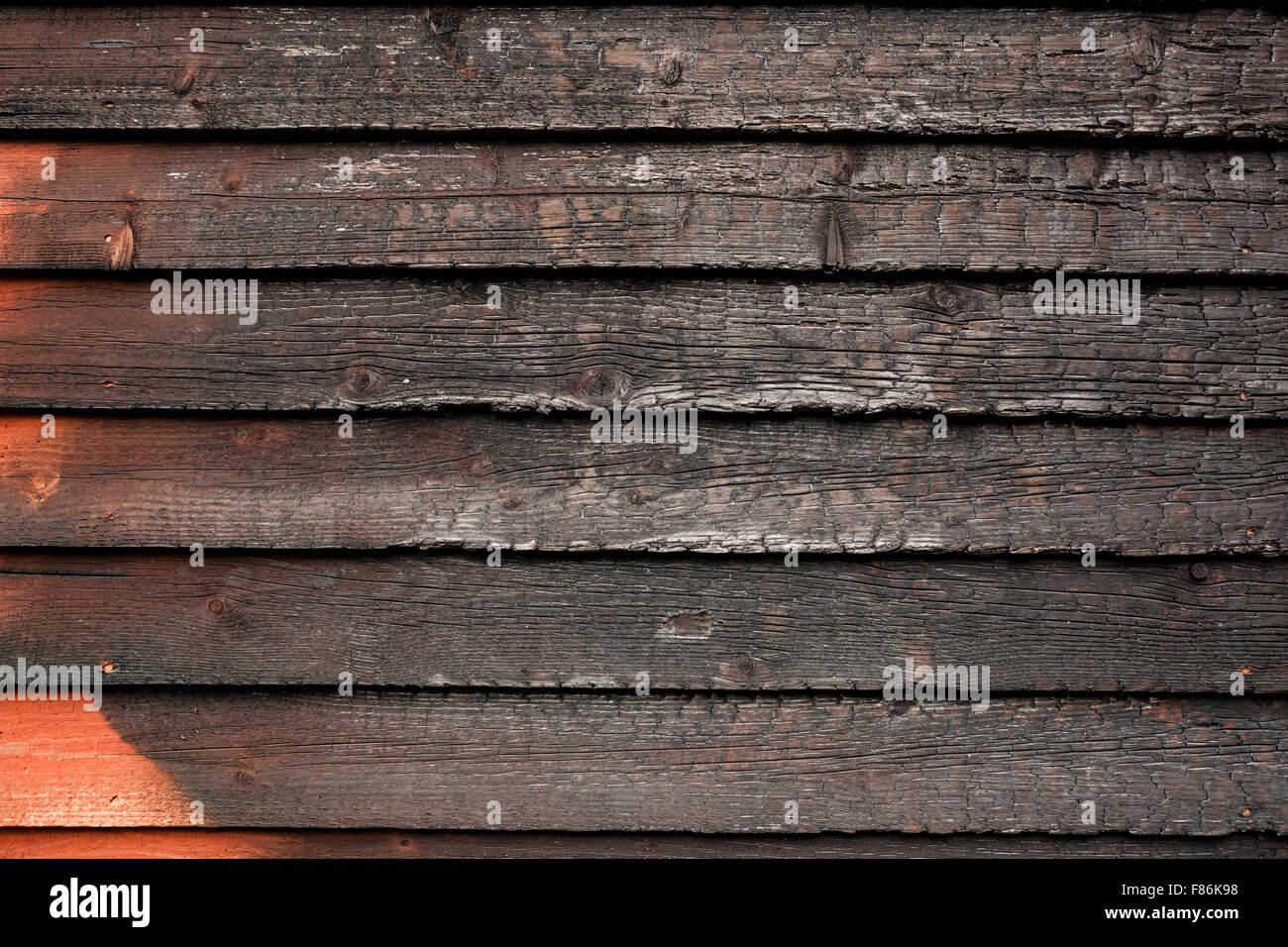 Burnt broken wood wall Stock Photo - Alamy