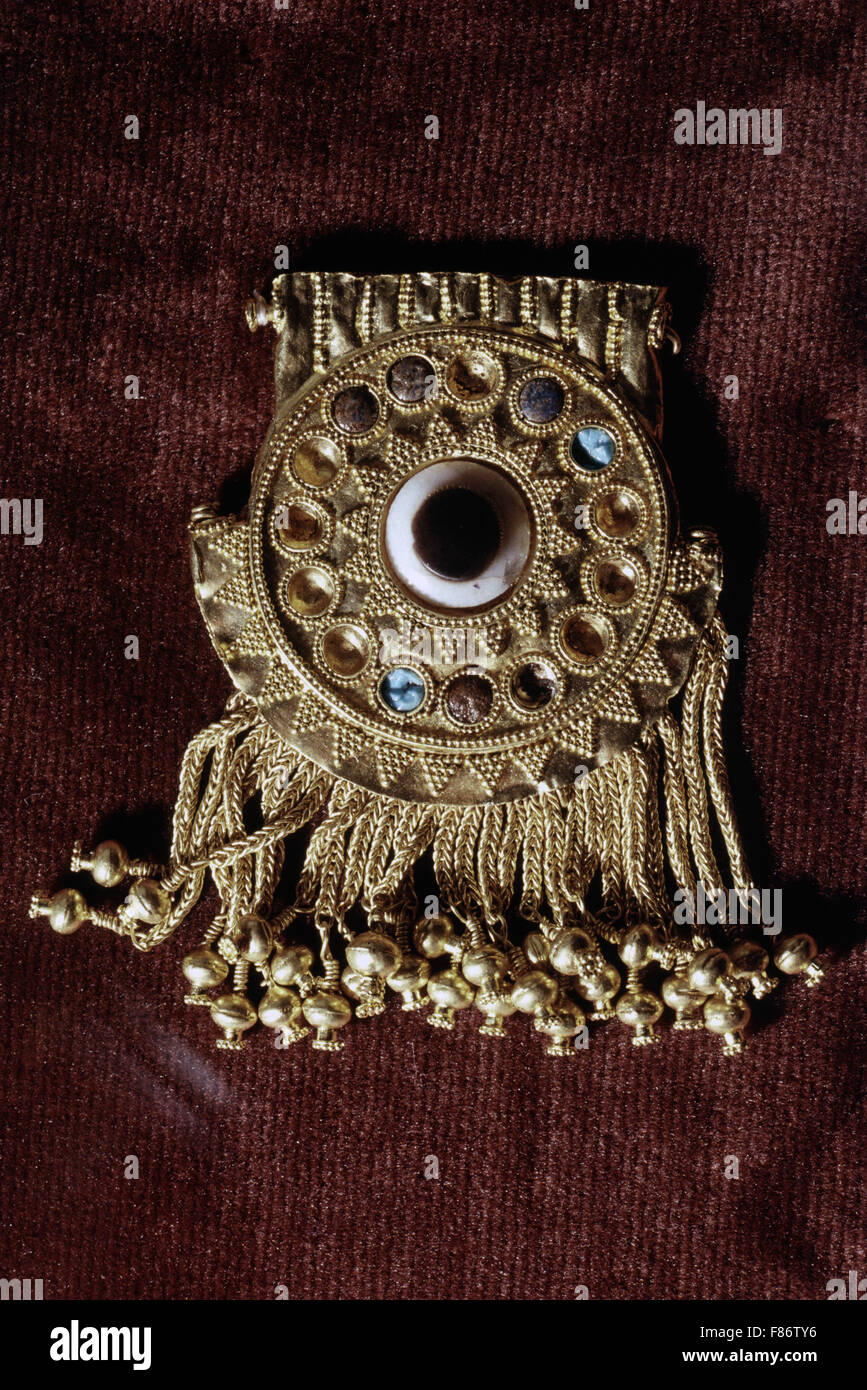 Jewelry from the 'Gold of Nimrud' - a collection of more than 1,000 gold and precious stones. Stock Photo