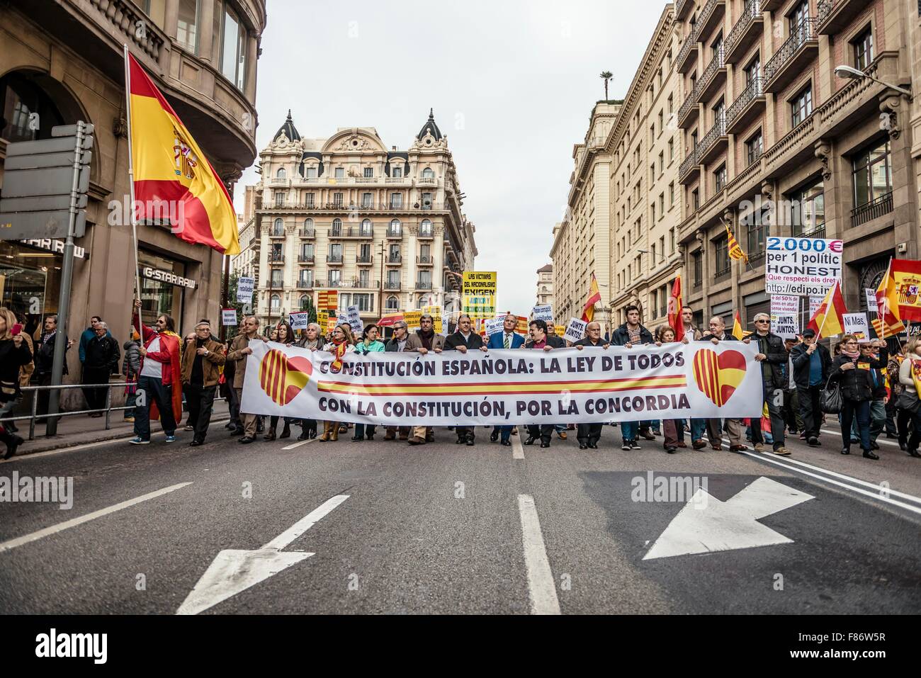 Barcelona, Spain. 06th Dec, 2015. Demonstrators holding placards march behind their banner for the indissoluble unity of the Spanish nation and against a hypothetical independence of Catalonia on the Spanish constitution day. Credit:  matthi/Alamy Live News Stock Photo