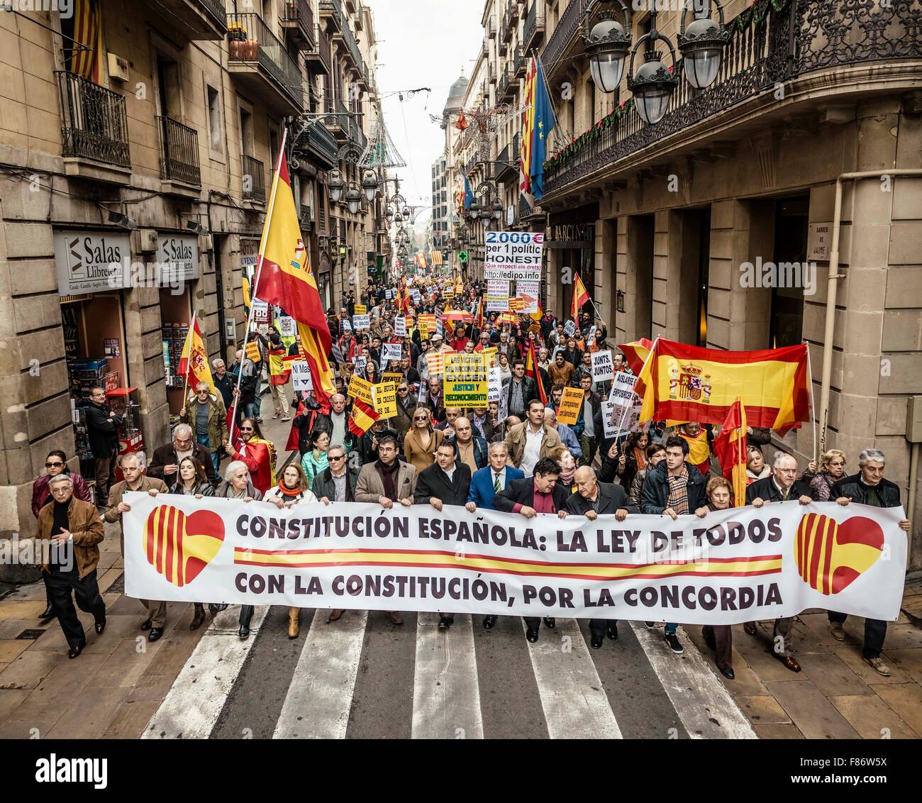 Barcelona, Spain. 06th Dec, 2015. Demonstrators holding placards march behind their banner for the indissoluble unity of the Spanish nation and against a hypothetical independence of Catalonia on the Spanish constitution day. Credit:  matthi/Alamy Live News Stock Photo