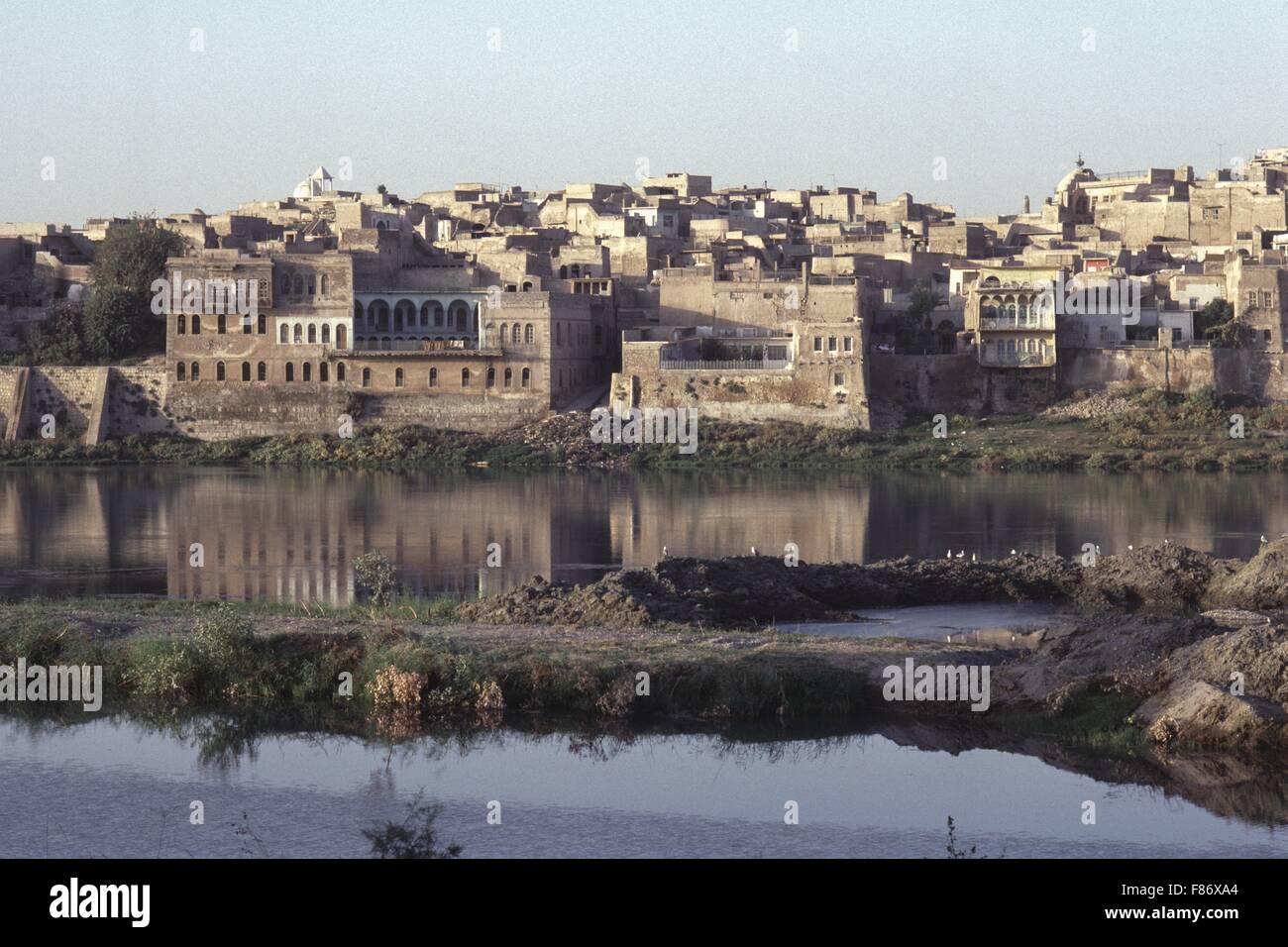 Nineveh, Iraq - A pastoral view of old houses at Nineveh on the banks of the Tigris not far from Nimrud, near Mosul. Stock Photo
