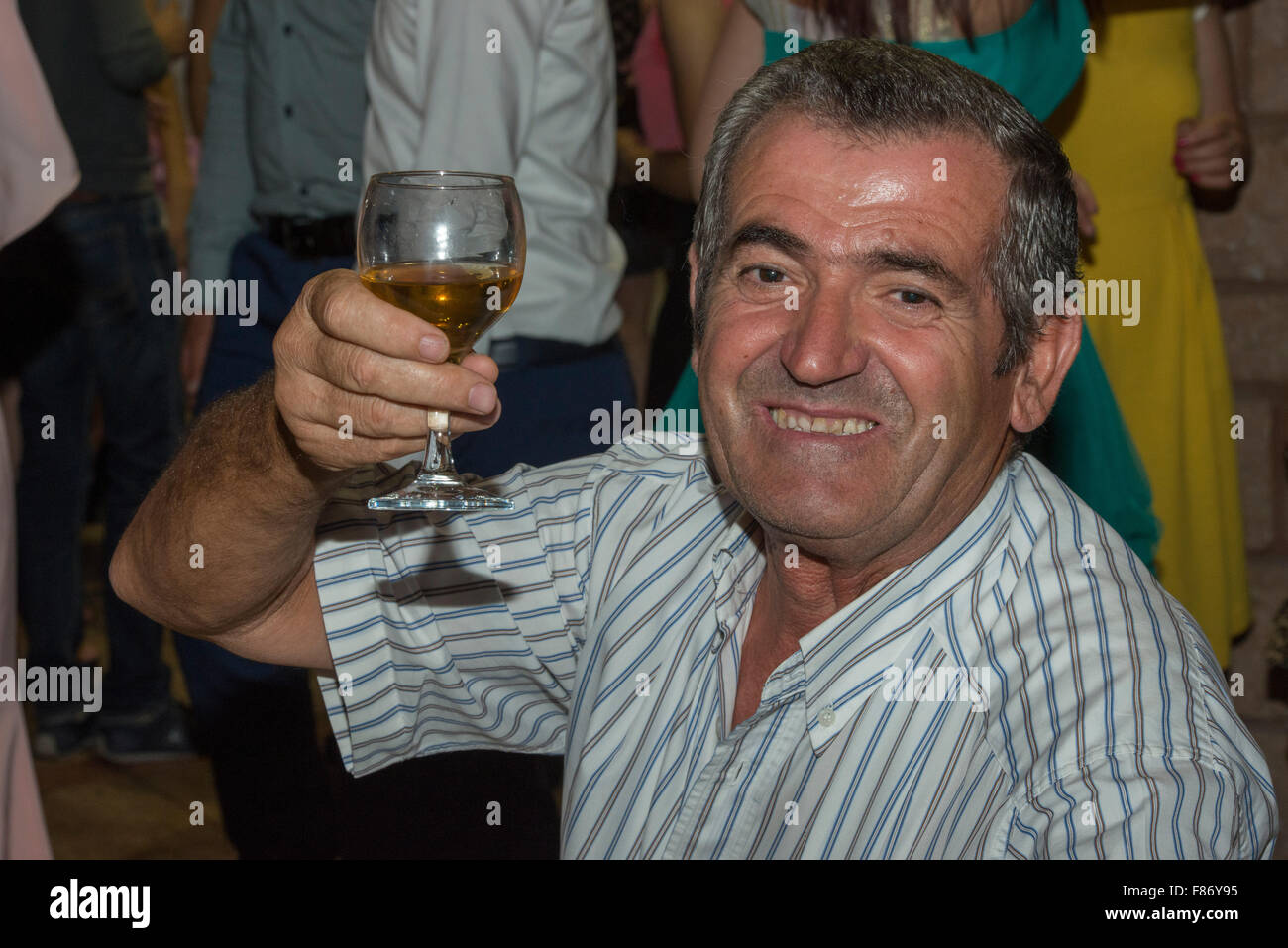 Man With A Glass Of Brandy, Albanian Wedding, Kruja Stock Photo