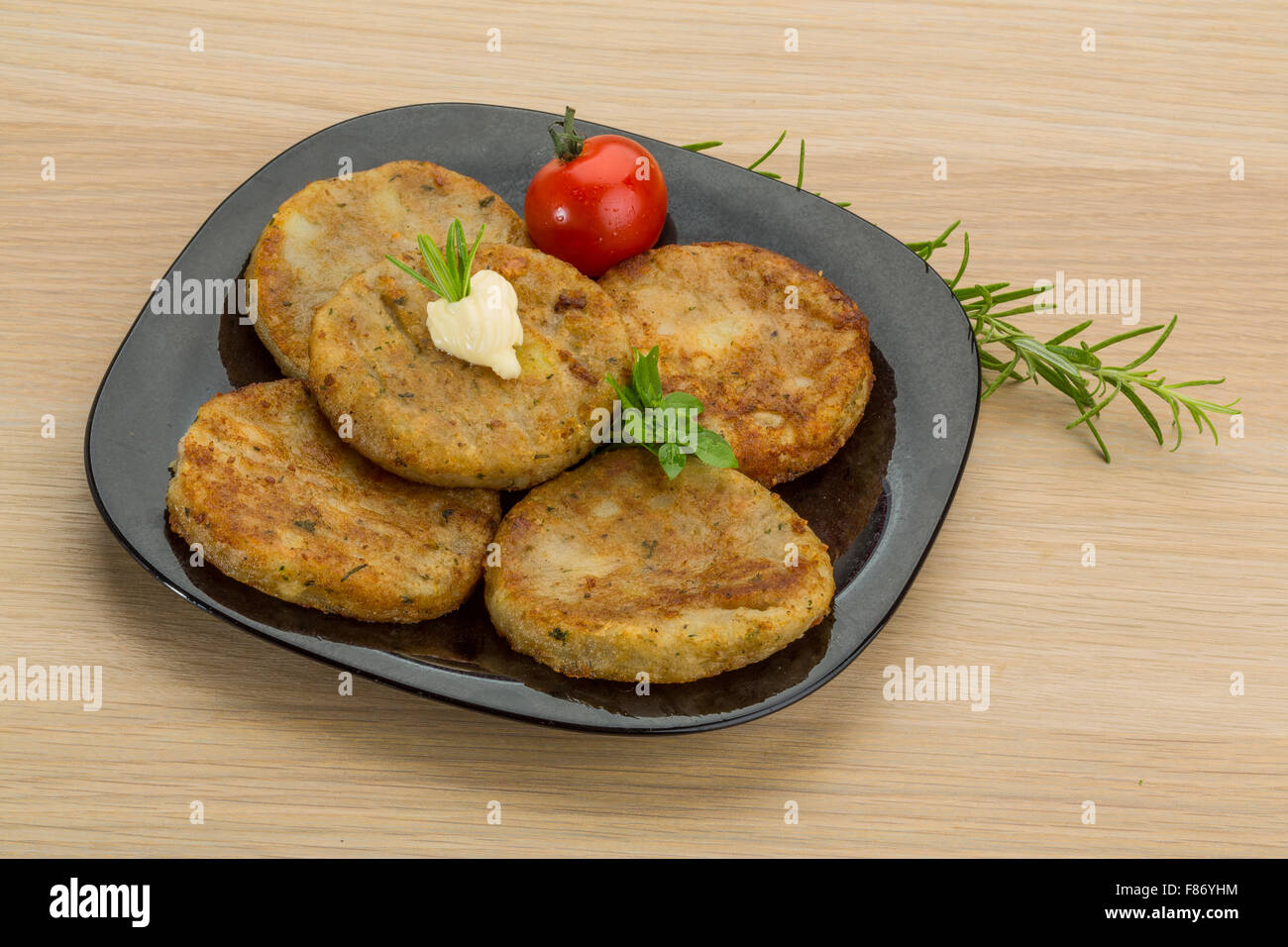 Hash brown with cream and herbs Stock Photo Alamy