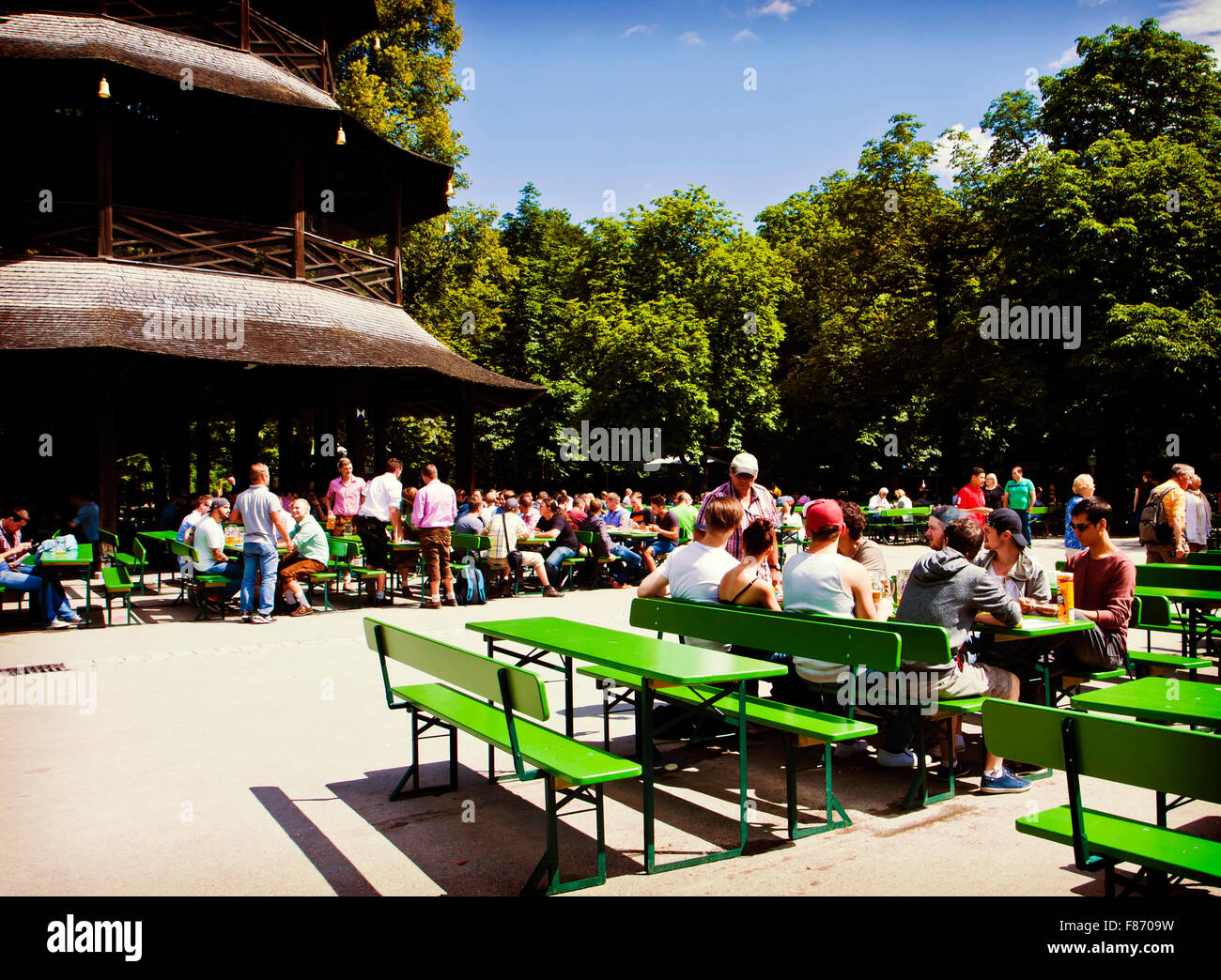 MUNICH, GERMANY -  Chinese tower beer garden at Englisher Garten in Munich offers visitors a traditional Bavarian beer Stock Photo