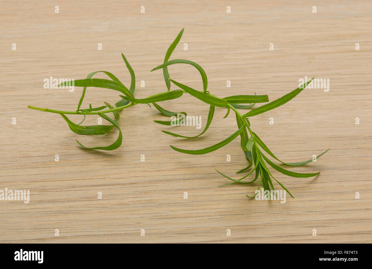 Tarragon leaves on the desk Stock Photo Alamy