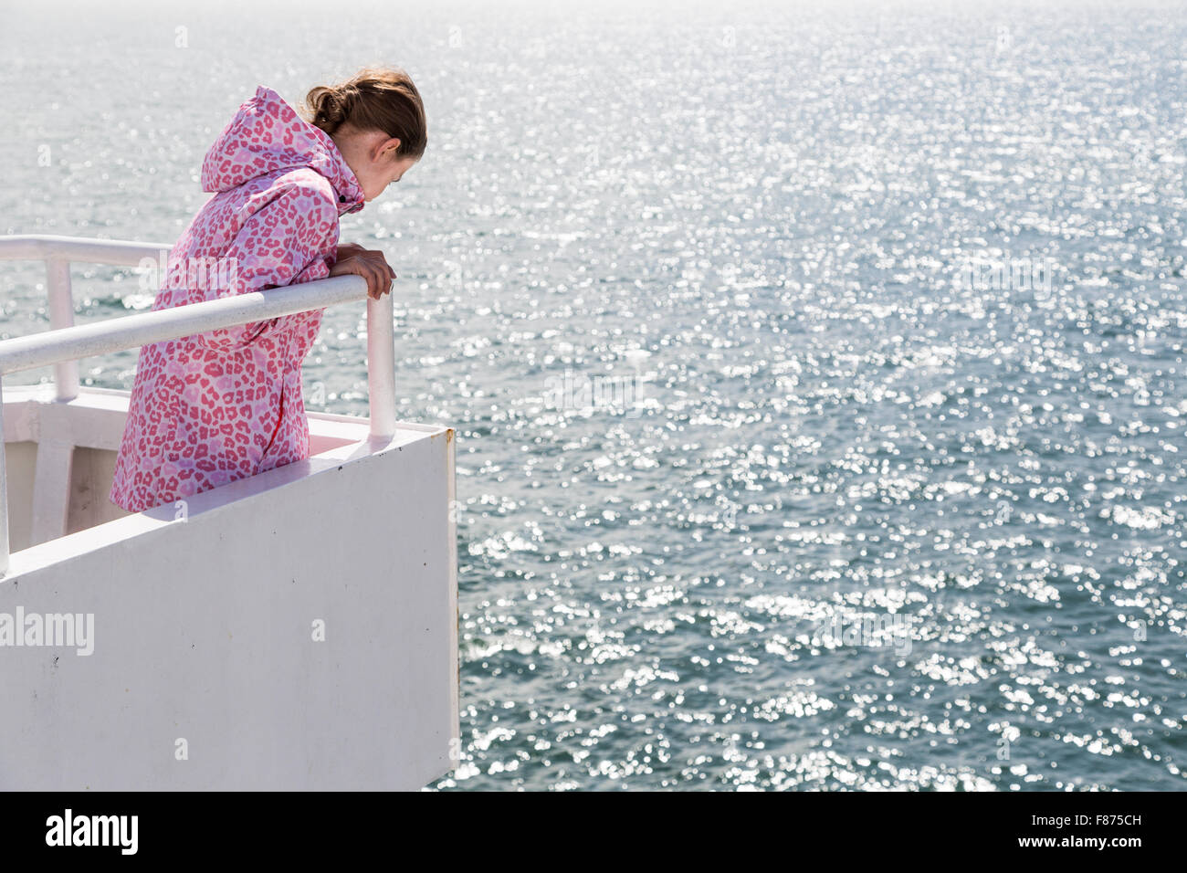 girl-looking-down-at-sea-from-viewing-deck-of-the-dfds-dunkirk-to-dover