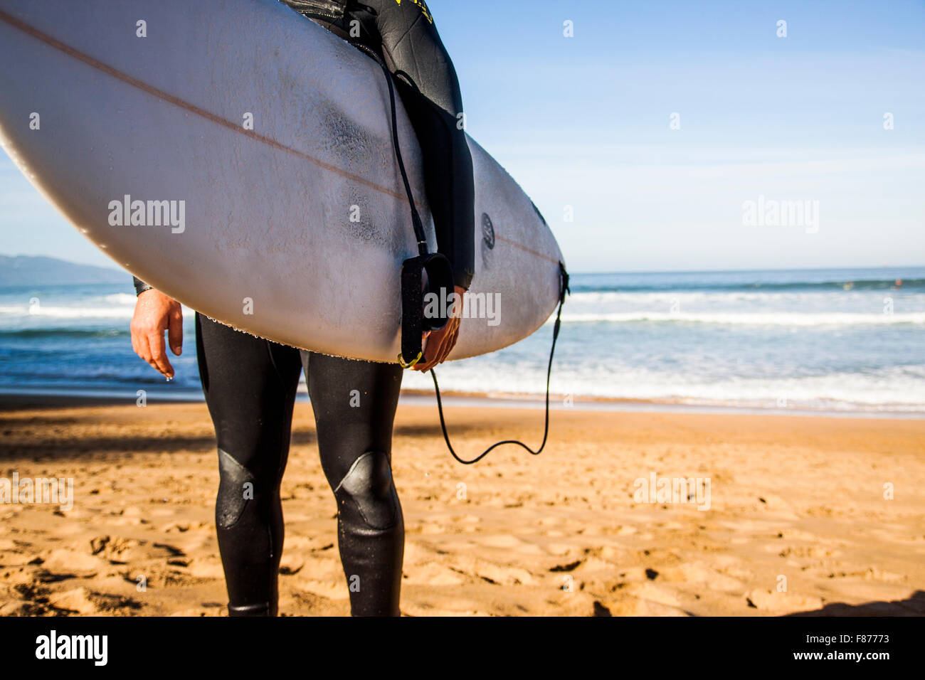 Surfer standing watching the sea hi-res stock photography and images ...