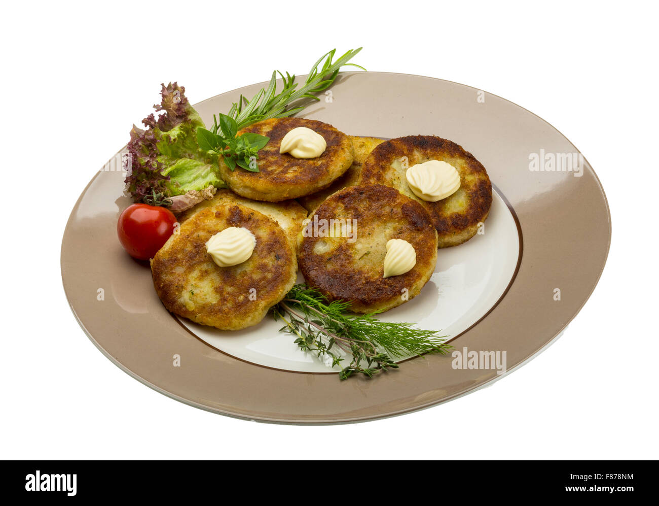 Hash browns with herbs on the plate Stock Photo Alamy