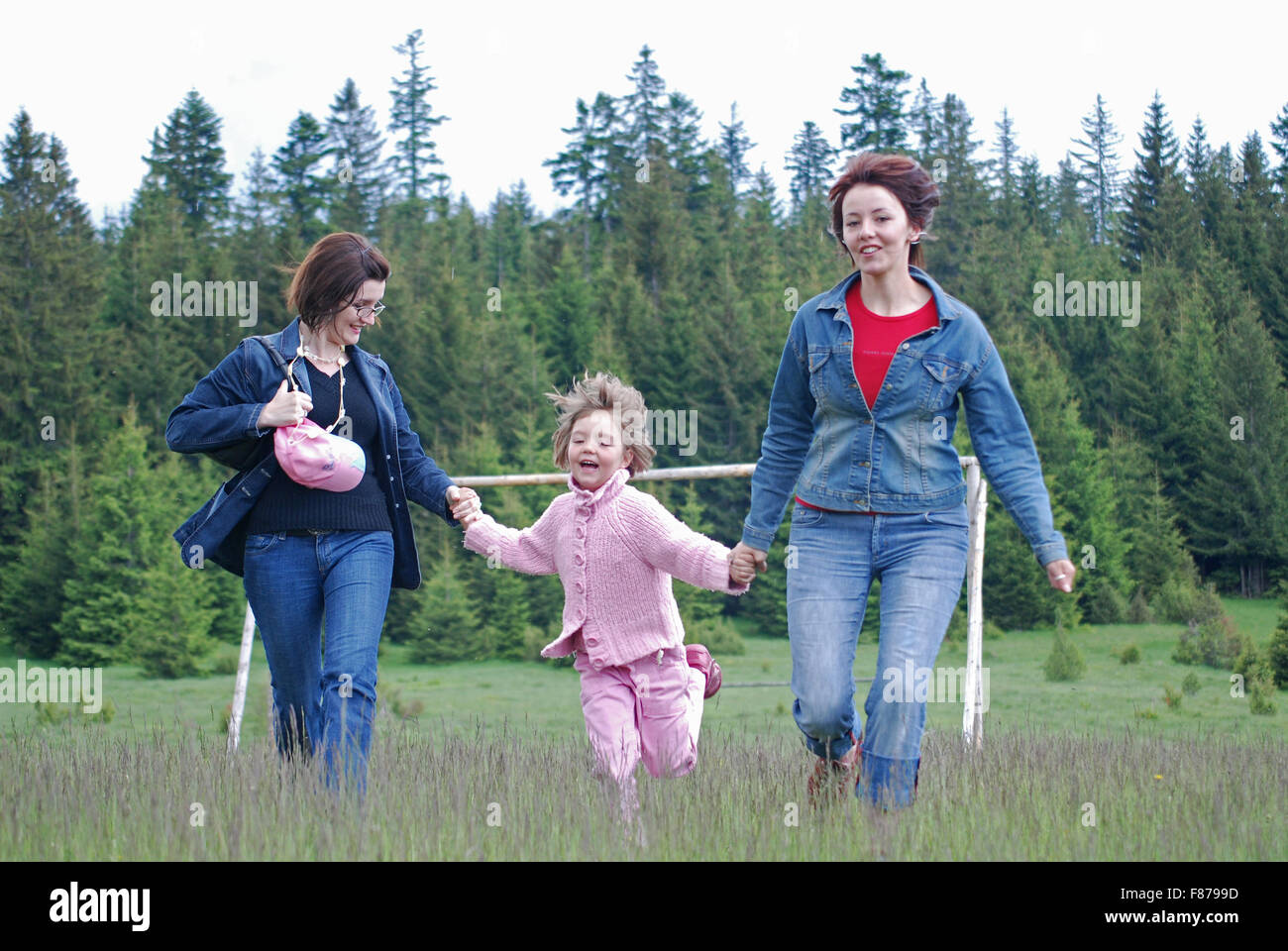 happy girls running in nature Stock Photo - Alamy