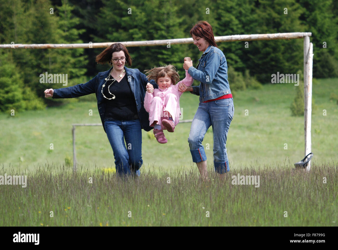 happy girls running in nature Stock Photo - Alamy
